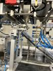Used All Fill B100PM Premade Pouch Machine with SV600 auger filler and secondary vibratory feeder. Accepts bag sizes 4