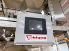 Tridyne Process Systems Automatic Vibratory Feeder & Net-weighing System
