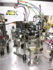 Used PSG Lee Model RP-8BT-Z Premade Pouch Filler/Sealer. Designed for pouches with gusset stand-up bottom, and with zipper seal. Pouch size range: 3.9