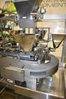 Used- Roberts Model IMP-1500 Horizontal Pre Form Pouch Machine. Capable of speeds up to 50 pouches per minute (depending on ...