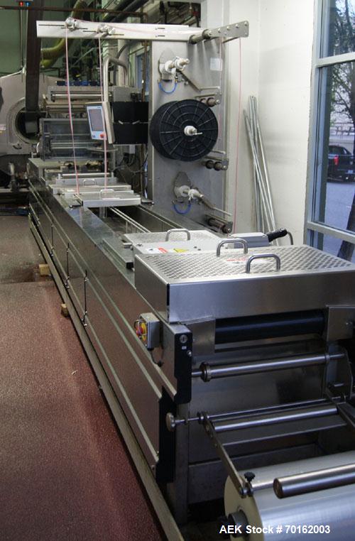 Used Multivac Model R240 Zipper Machine. Machine chassis frame length 21'. Die center distance 15' to 14.5', loading area 6.64'. Advance length 300 mm. Web width 420 mm. Standard forming depth 130 mm...