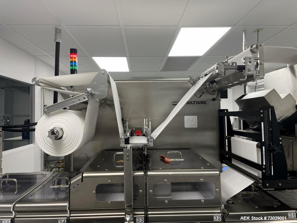 Multivac Model R245 Thermoformer with Fanuc Robotic Loaders for Swab Sticks