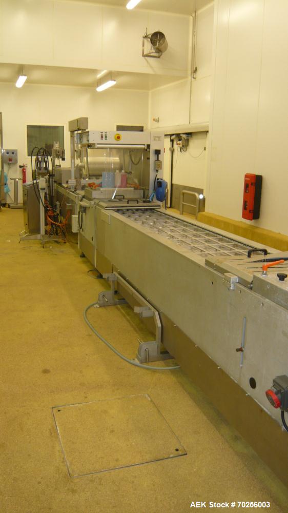 Used Multivac Thermoforming Line. Model R7000. Film width - 20.6” (522 mm). Fully refurbished 2006.
