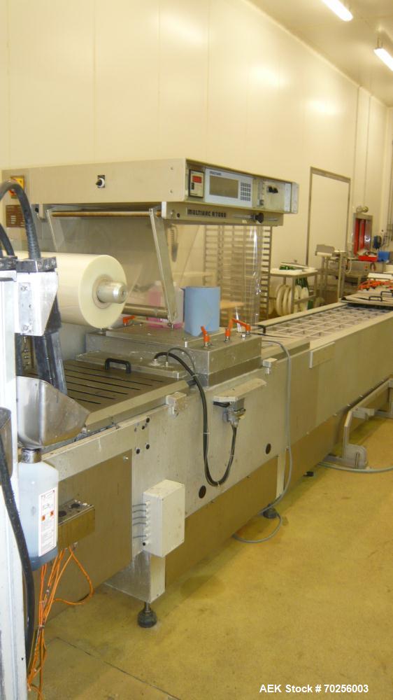 Used Multivac Thermoforming Line. Model R7000. Film width - 20.6” (522 mm). Fully refurbished 2006.