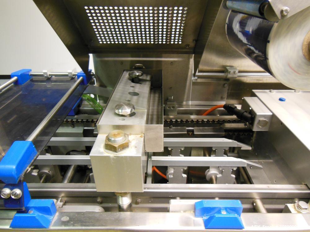 Used Repak (Reiser) Model RE20/4 FB420 Horizontal Form Fill Seal Thermoform Rollstock MAP Packager. 420mm web width, 380m useable Last used in Lunch Meat Food application, mainframe substantially con...