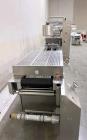 Used Multisource roll stock machine with Busch RAO630 vacuum pump and tooling.