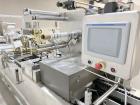 Used Multisource roll stock machine with Busch RAO630 vacuum pump and tooling.
