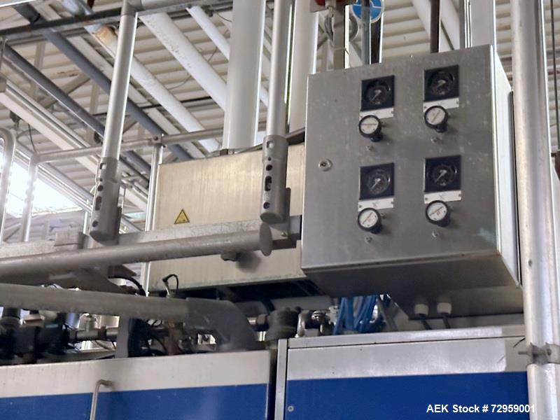 Used Combibloc (Sig) Model 112-32 Aseptic Brick Pack Cartoning Lines. The fillers are capable of running 125 ml, 150 ml, 200 ml or 250 ml cartons (with changeparts). Has Sig Beckhoff HMI with Siemens...
