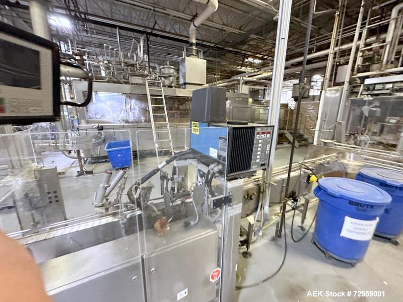 Used Combibloc (Sig) Model 112-32 Aseptic Brick Pack Cartoning Lines. The fillers are capable of running 125 ml, 150 ml, 200 ml or 250 ml cartons (with changeparts). Has Sig Beckhoff HMI with Siemens...