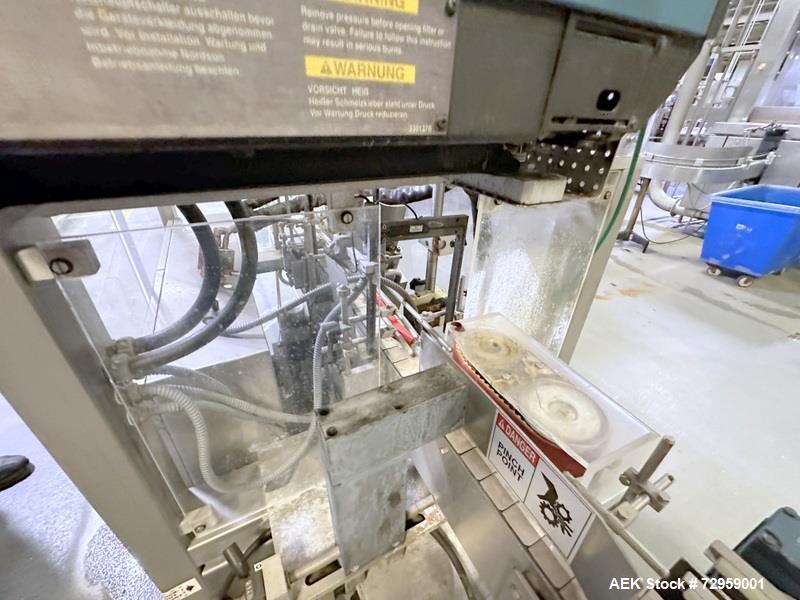 Used Combibloc (Sig) Model 112-32 Aseptic Brick Pack Cartoning Lines. The fillers are capable of running 125 ml, 150 ml, 200 ml or 250 ml cartons (with changeparts). Has Sig Beckhoff HMI with Siemens...