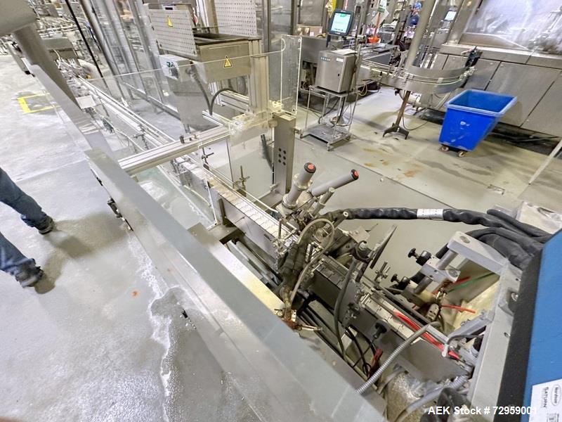 Used Combibloc (Sig) Model 112-32 Aseptic Brick Pack Cartoning Lines. The fillers are capable of running 125 ml, 150 ml, 200 ml or 250 ml cartons (with changeparts). Has Sig Beckhoff HMI with Siemens...