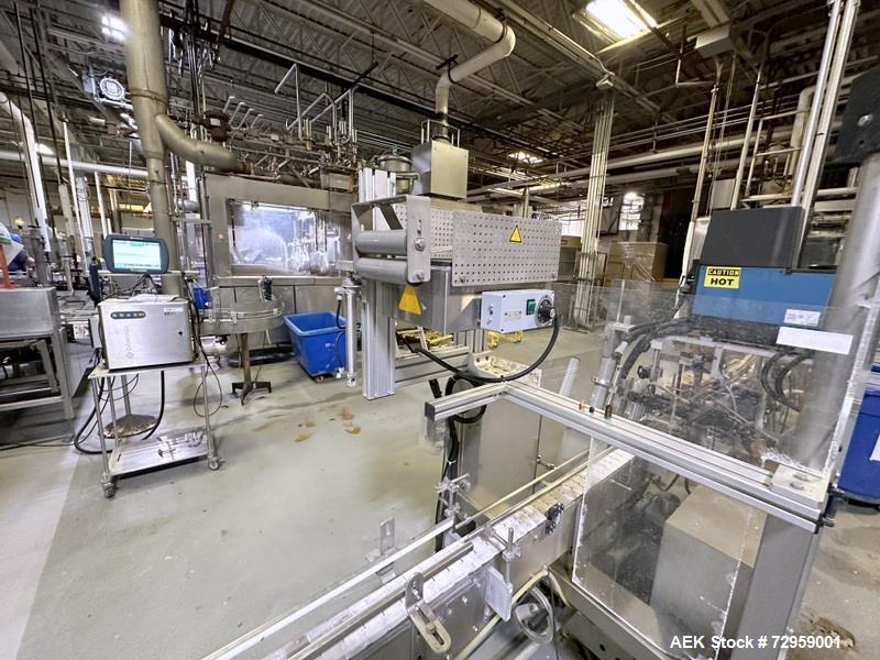 Used Combibloc (Sig) Model 112-32 Aseptic Brick Pack Cartoning Lines. The fillers are capable of running 125 ml, 150 ml, 200 ml or 250 ml cartons (with changeparts). Has Sig Beckhoff HMI with Siemens...