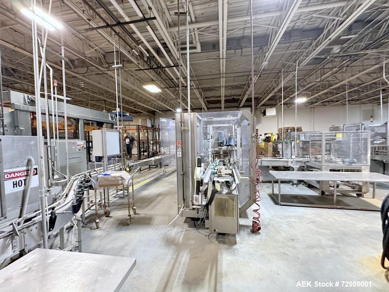 Used Combibloc (Sig) Model 112-32 Aseptic Brick Pack Cartoning Lines. The fillers are capable of running 125 ml, 150 ml, 200 ml or 250 ml cartons (with changeparts). Has Sig Beckhoff HMI with Siemens...