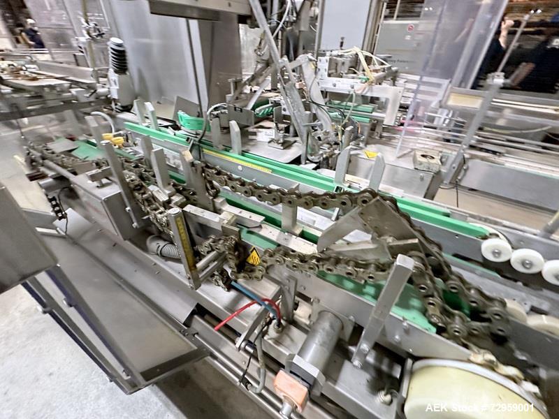 Used Combibloc (Sig) Model 112-32 Aseptic Brick Pack Cartoning Lines. The fillers are capable of running 125 ml, 150 ml, 200 ml or 250 ml cartons (with changeparts). Has Sig Beckhoff HMI with Siemens...