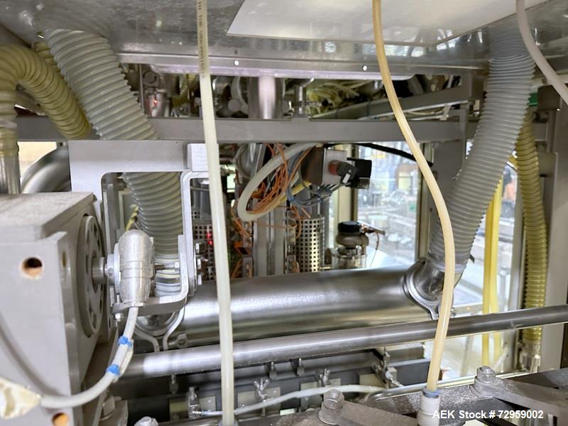 Used Combibloc (Sig) Model 112-32 Aseptic Brick Pack Cartoning Lines. The fillers are capable of running 125 ml, 150 ml, 200 ml or 250 ml cartons (with changeparts). Has Sig Beckhoff HMI with Siemens...