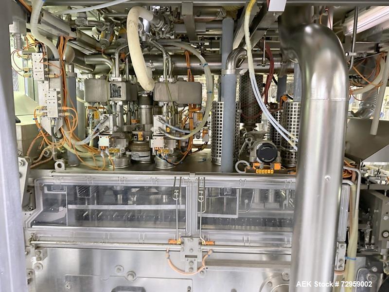 Used Combibloc (Sig) Model 112-32 Aseptic Brick Pack Cartoning Lines. The fillers are capable of running 125 ml, 150 ml, 200 ml or 250 ml cartons (with changeparts). Has Sig Beckhoff HMI with Siemens...