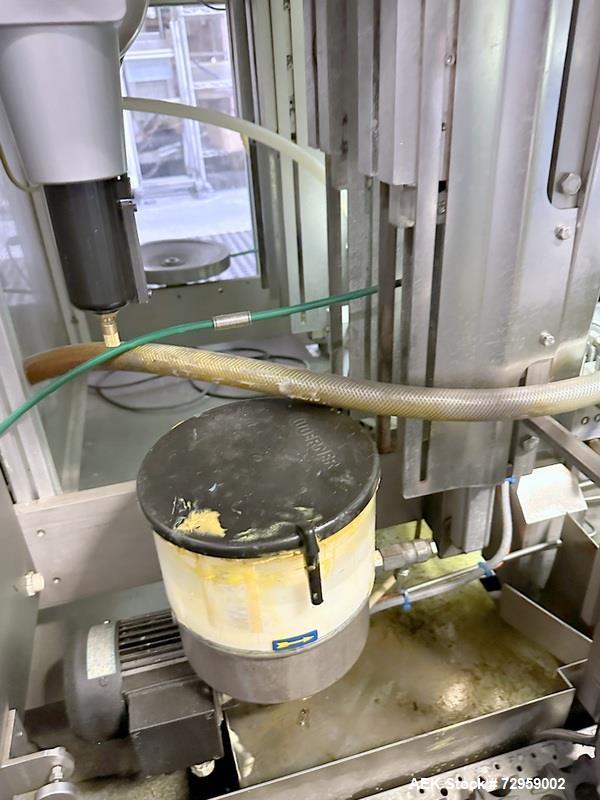 Used Combibloc (Sig) Model 112-32 Aseptic Brick Pack Cartoning Lines. The fillers are capable of running 125 ml, 150 ml, 200 ml or 250 ml cartons (with changeparts). Has Sig Beckhoff HMI with Siemens...
