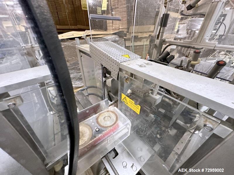 Used Combibloc (Sig) Model 112-32 Aseptic Brick Pack Cartoning Lines. The fillers are capable of running 125 ml, 150 ml, 200 ml or 250 ml cartons (with changeparts). Has Sig Beckhoff HMI with Siemens...