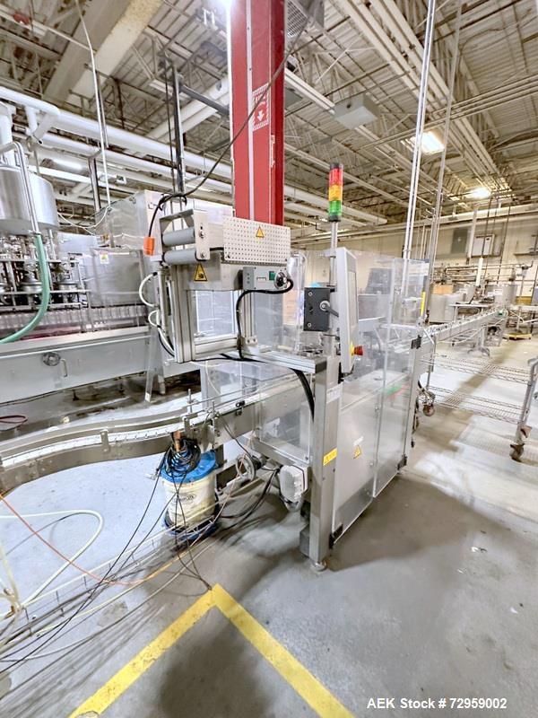 Used Combibloc (Sig) Model 112-32 Aseptic Brick Pack Cartoning Lines. The fillers are capable of running 125 ml, 150 ml, 200 ml or 250 ml cartons (with changeparts). Has Sig Beckhoff HMI with Siemens...