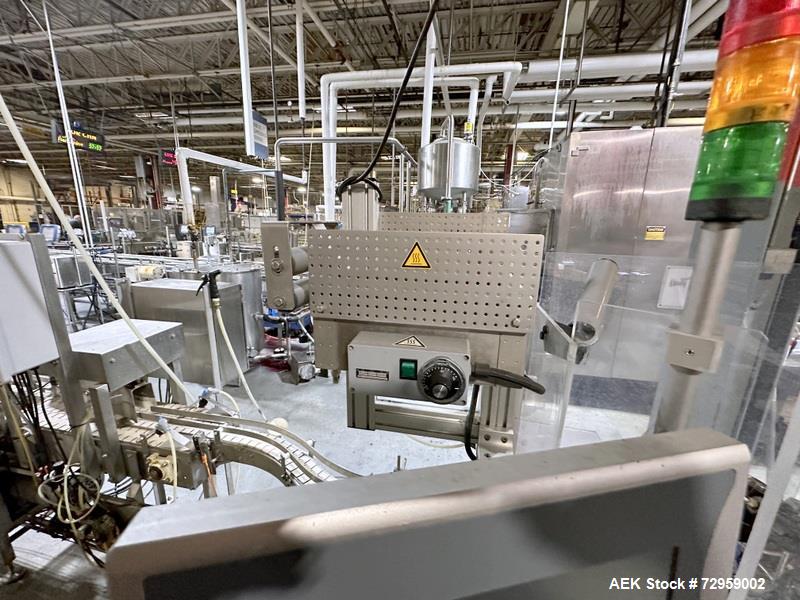 Used Combibloc (Sig) Model 112-32 Aseptic Brick Pack Cartoning Lines. The fillers are capable of running 125 ml, 150 ml, 200 ml or 250 ml cartons (with changeparts). Has Sig Beckhoff HMI with Siemens...