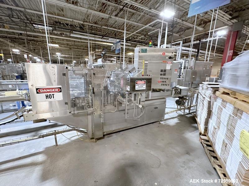 Used Combibloc (Sig) Model 112-32 Aseptic Brick Pack Cartoning Lines. The fillers are capable of running 125 ml, 150 ml, 200 ml or 250 ml cartons (with changeparts). Has Sig Beckhoff HMI with Siemens...