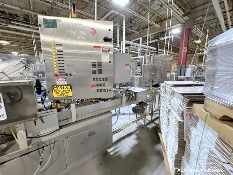 Used Combibloc (Sig) Model 112-32 Aseptic Brick Pack Cartoning Lines. The fillers are capable of running 125 ml, 150 ml, 200 ml or 250 ml cartons (with changeparts). Has Sig Beckhoff HMI with Siemens...