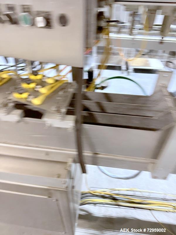 Used Combibloc (Sig) Model 112-32 Aseptic Brick Pack Cartoning Lines. The fillers are capable of running 125 ml, 150 ml, 200 ml or 250 ml cartons (with changeparts). Has Sig Beckhoff HMI with Siemens...