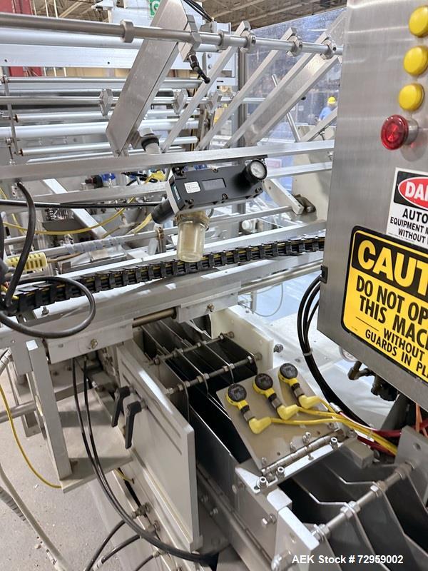 Used Combibloc (Sig) Model 112-32 Aseptic Brick Pack Cartoning Lines. The fillers are capable of running 125 ml, 150 ml, 200 ml or 250 ml cartons (with changeparts). Has Sig Beckhoff HMI with Siemens...