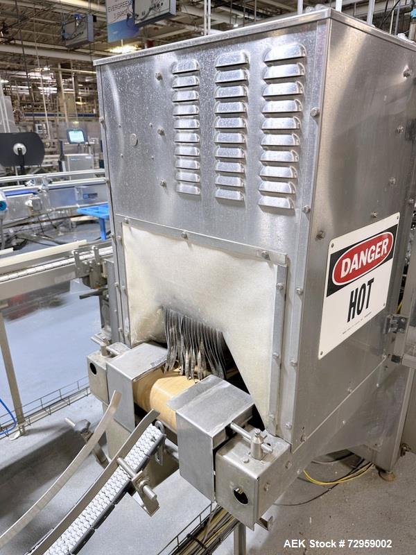 Used Combibloc (Sig) Model 112-32 Aseptic Brick Pack Cartoning Lines. The fillers are capable of running 125 ml, 150 ml, 200 ml or 250 ml cartons (with changeparts). Has Sig Beckhoff HMI with Siemens...