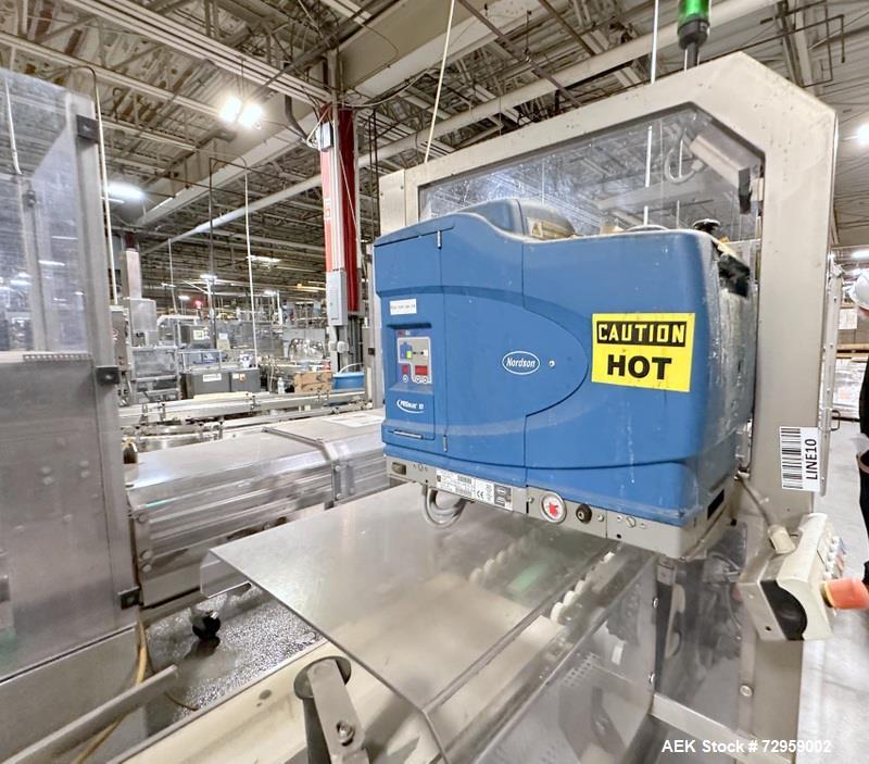 Used Combibloc (Sig) Model 112-32 Aseptic Brick Pack Cartoning Lines. The fillers are capable of running 125 ml, 150 ml, 200 ml or 250 ml cartons (with changeparts). Has Sig Beckhoff HMI with Siemens...