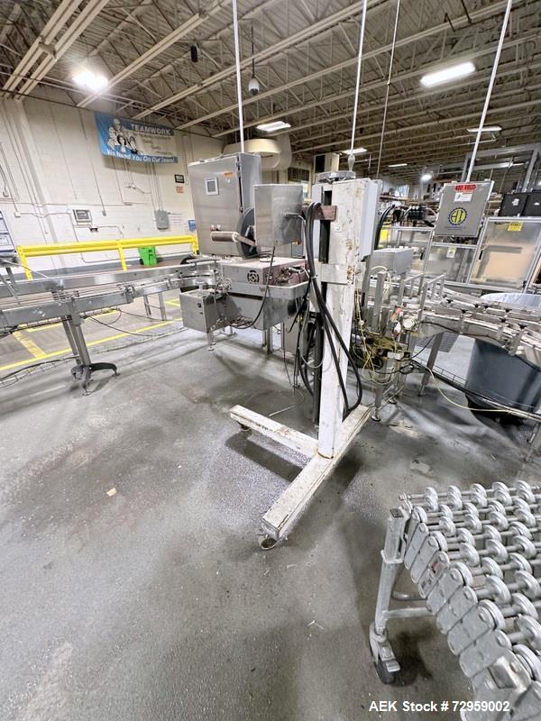 Used Combibloc (Sig) Model 112-32 Aseptic Brick Pack Cartoning Lines. The fillers are capable of running 125 ml, 150 ml, 200 ml or 250 ml cartons (with changeparts). Has Sig Beckhoff HMI with Siemens...