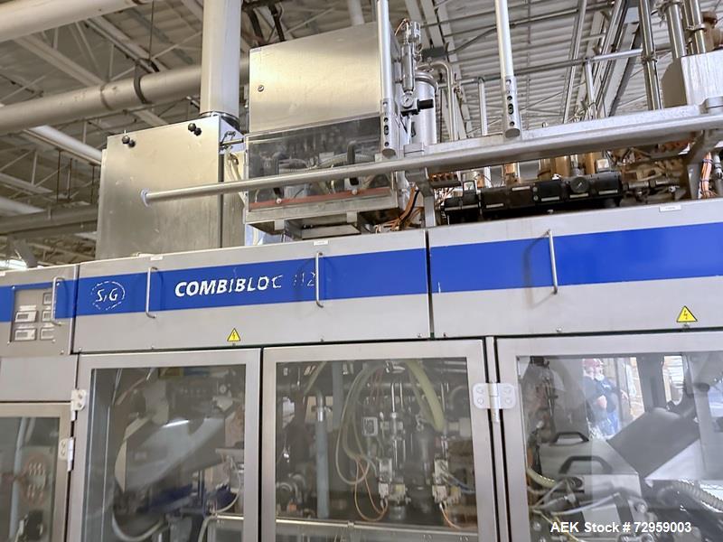 Used Combibloc (Sig) Model 112-32 Aseptic Brick Pack Cartoning Lines. The fillers are capable of running 125 ml, 150 ml, 200 ml or 250 ml cartons (with changeparts). Has Sig Beckhoff HMI with Siemens...
