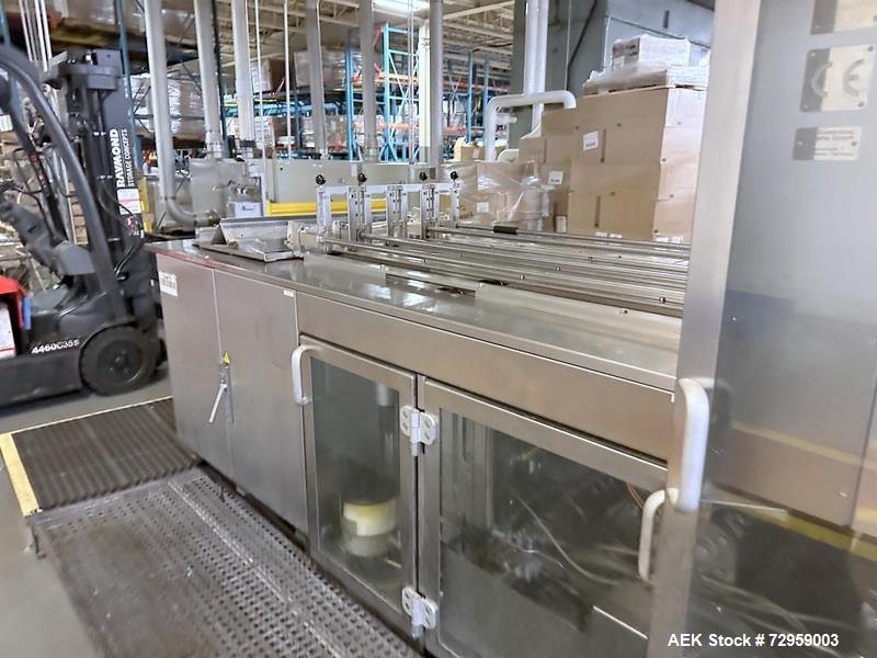 Used Combibloc (Sig) Model 112-32 Aseptic Brick Pack Cartoning Lines. The fillers are capable of running 125 ml, 150 ml, 200 ml or 250 ml cartons (with changeparts). Has Sig Beckhoff HMI with Siemens...
