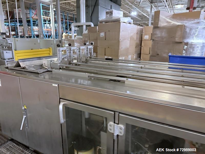 Used Combibloc (Sig) Model 112-32 Aseptic Brick Pack Cartoning Lines. The fillers are capable of running 125 ml, 150 ml, 200 ml or 250 ml cartons (with changeparts). Has Sig Beckhoff HMI with Siemens...