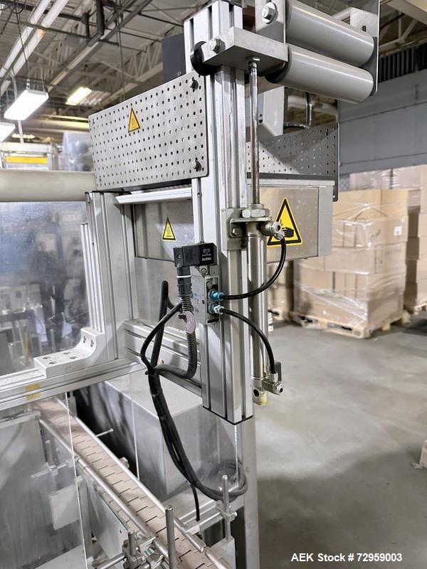 Used Combibloc (Sig) Model 112-32 Aseptic Brick Pack Cartoning Lines. The fillers are capable of running 125 ml, 150 ml, 200 ml or 250 ml cartons (with changeparts). Has Sig Beckhoff HMI with Siemens...
