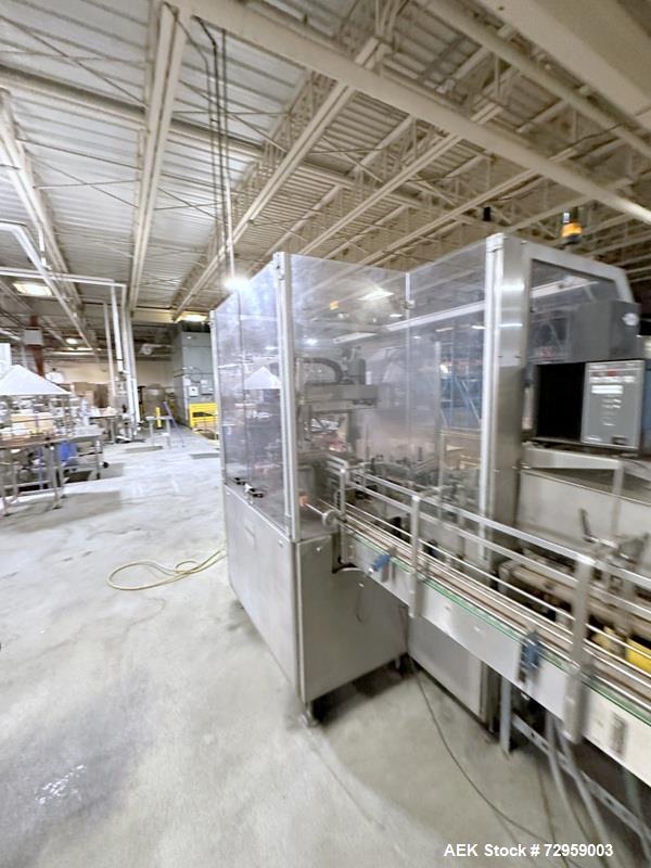 Used Combibloc (Sig) Model 112-32 Aseptic Brick Pack Cartoning Lines. The fillers are capable of running 125 ml, 150 ml, 200 ml or 250 ml cartons (with changeparts). Has Sig Beckhoff HMI with Siemens...