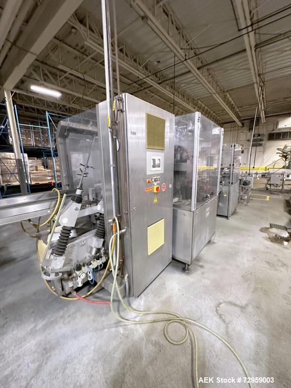 Used Combibloc (Sig) Model 112-32 Aseptic Brick Pack Cartoning Lines. The fillers are capable of running 125 ml, 150 ml, 200 ml or 250 ml cartons (with changeparts). Has Sig Beckhoff HMI with Siemens...