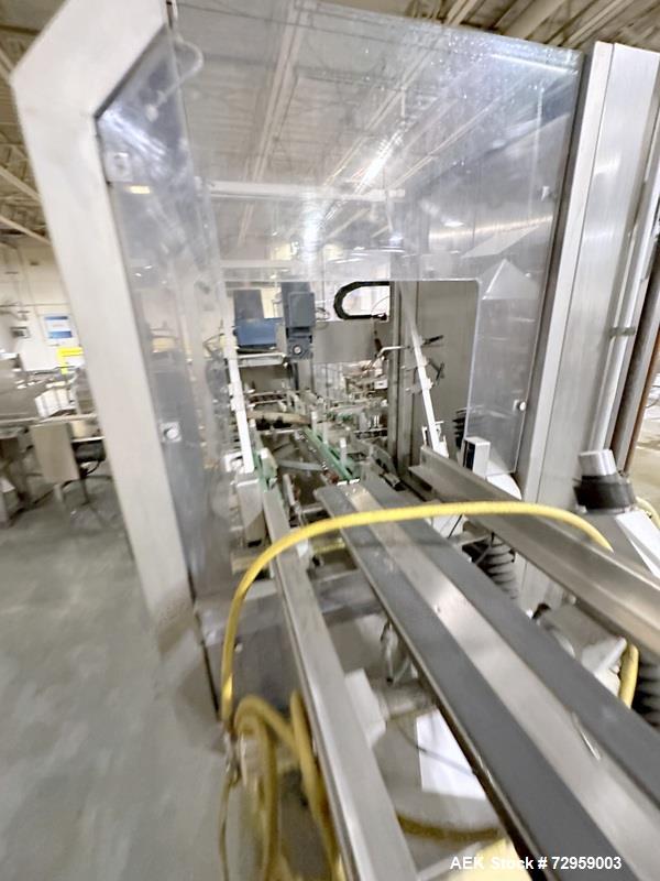 Used Combibloc (Sig) Model 112-32 Aseptic Brick Pack Cartoning Lines. The fillers are capable of running 125 ml, 150 ml, 200 ml or 250 ml cartons (with changeparts). Has Sig Beckhoff HMI with Siemens...