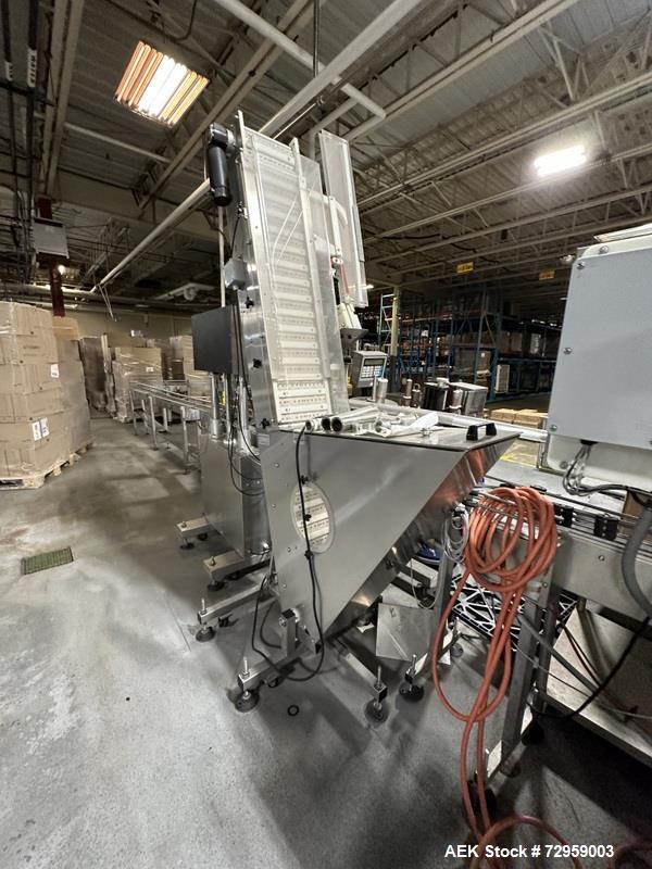 Used Combibloc (Sig) Model 112-32 Aseptic Brick Pack Cartoning Lines. The fillers are capable of running 125 ml, 150 ml, 200 ml or 250 ml cartons (with changeparts). Has Sig Beckhoff HMI with Siemens...