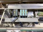 Used Combibloc (Sig) Model 112-32 Aseptic Brick Pack Cartoning Lines. The fillers are capable of running 125 ml, 150 ml, 200 ml or 250 ml cartons (with changeparts). Has Sig Beckhoff HMI with Siemens...