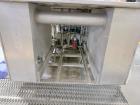 Used Combibloc (Sig) Model 112-32 Aseptic Brick Pack Cartoning Lines. The fillers are capable of running 125 ml, 150 ml, 200 ml or 250 ml cartons (with changeparts). Has Sig Beckhoff HMI with Siemens...