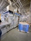 Used Combibloc (Sig) Model 112-32 Aseptic Brick Pack Cartoning Lines. The fillers are capable of running 125 ml, 150 ml, 200 ml or 250 ml cartons (with changeparts). Has Sig Beckhoff HMI with Siemens...