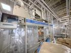 Used Combibloc (Sig) Model 112-32 Aseptic Brick Pack Cartoning Lines. The fillers are capable of running 125 ml, 150 ml, 200 ml or 250 ml cartons (with changeparts). Has Sig Beckhoff HMI with Siemens...