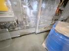 Used Combibloc (Sig) Model 112-32 Aseptic Brick Pack Cartoning Lines. The fillers are capable of running 125 ml, 150 ml, 200 ml or 250 ml cartons (with changeparts). Has Sig Beckhoff HMI with Siemens...