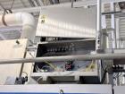 Used Combibloc (Sig) Model 112-32 Aseptic Brick Pack Cartoning Lines. The fillers are capable of running 125 ml, 150 ml, 200 ml or 250 ml cartons (with changeparts). Has Sig Beckhoff HMI with Siemens...