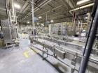Used Combibloc (Sig) Model 112-32 Aseptic Brick Pack Cartoning Lines. The fillers are capable of running 125 ml, 150 ml, 200 ml or 250 ml cartons (with changeparts). Has Sig Beckhoff HMI with Siemens...