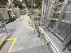 Used Combibloc (Sig) Model 112-32 Aseptic Brick Pack Cartoning Lines. The fillers are capable of running 125 ml, 150 ml, 200 ml or 250 ml cartons (with changeparts). Has Sig Beckhoff HMI with Siemens...