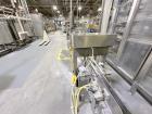 Used Combibloc (Sig) Model 112-32 Aseptic Brick Pack Cartoning Lines. The fillers are capable of running 125 ml, 150 ml, 200 ml or 250 ml cartons (with changeparts). Has Sig Beckhoff HMI with Siemens...