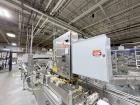 Used Combibloc (Sig) Model 112-32 Aseptic Brick Pack Cartoning Lines. The fillers are capable of running 125 ml, 150 ml, 200 ml or 250 ml cartons (with changeparts). Has Sig Beckhoff HMI with Siemens...