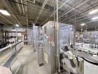 Used Combibloc (Sig) Model 112-32 Aseptic Brick Pack Cartoning Lines. The fillers are capable of running 125 ml, 150 ml, 200 ml or 250 ml cartons (with changeparts). Has Sig Beckhoff HMI with Siemens...